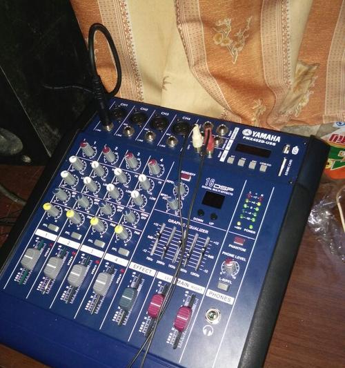 电脑播放音乐时拍照为何会有声音？如何关闭拍照声音？